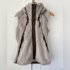 Faux fur vest with hidden zip hood